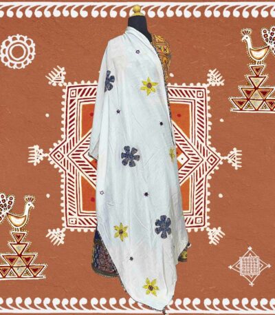 Off-white muslin silk dupatta with embroidered flowers and mirror work applique detailing.