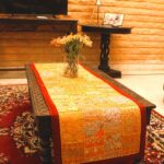 Main product image: Exquisite Barmer red table runner with handcrafted cotton embroidered patchwork flower and leaf design